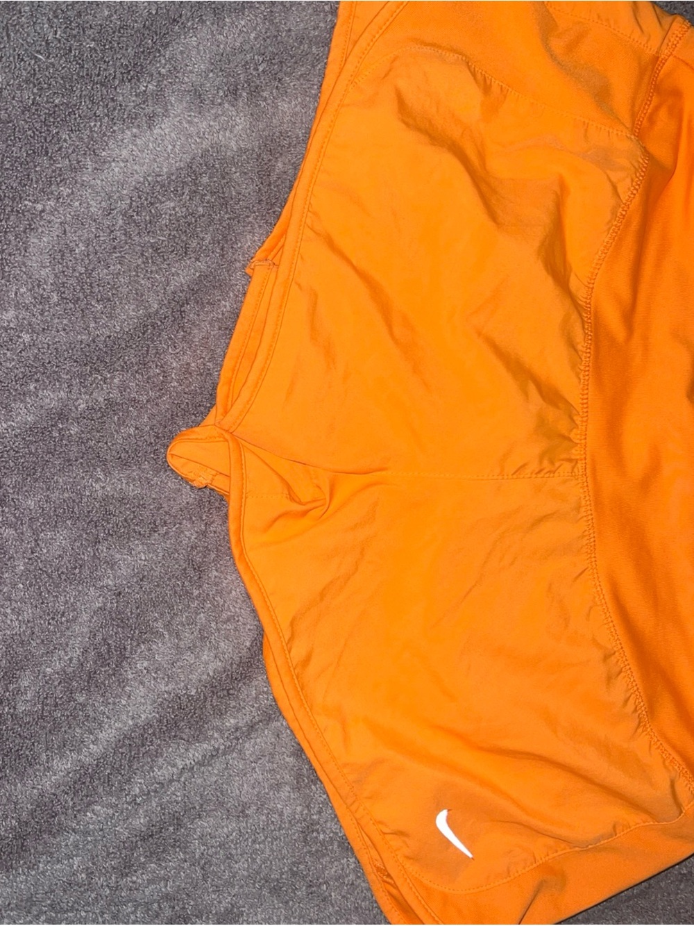 Nike women’s med Orange Running Shorts with White Swoosh and liner